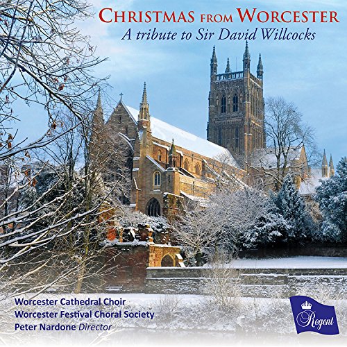 "CD cover featuring a snowy cathedral with red and blue title text."