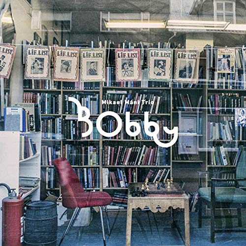 "Vinyl album cover with 'Bobby' text, featuring a cozy library background scene."
