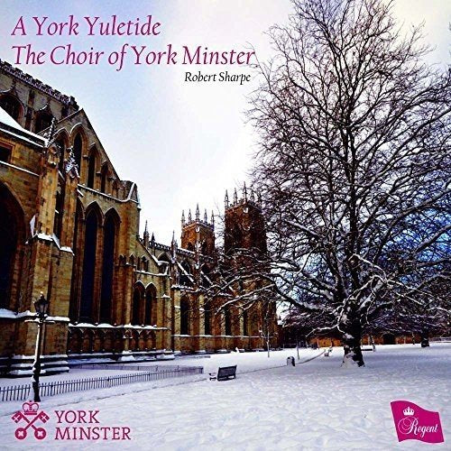"CD cover featuring York Minster cathedral in a snowy landscape with pink text and logos."
