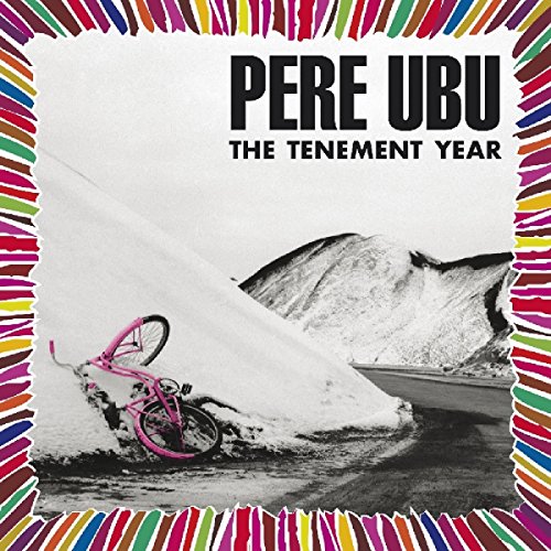 Album cover with pink bike buried in snow, multicolored border, and bold black text.