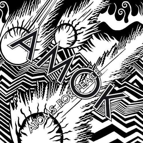 "Black and white album cover with abstract, chaotic design and 'Atoms For Peace' text."