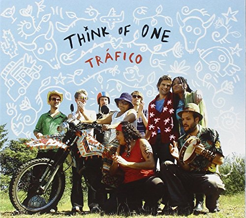 Album cover with a group of people posing with a decorated motorcycle.