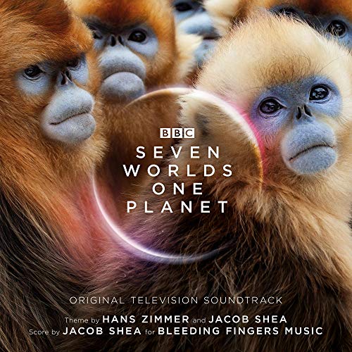 Close-up of golden snub-nosed monkeys with the Seven Worlds One Planet text overlay.