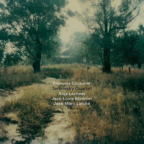 "Album cover with a serene landscape and artist names in white text."