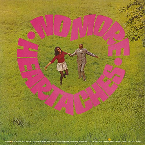 Orange vinyl record with cover art featuring couple in a grassy field.
