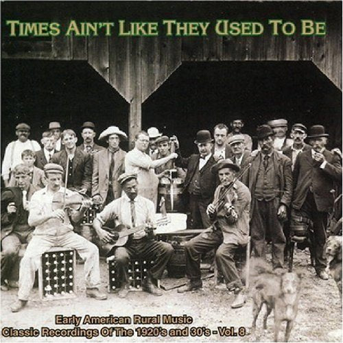"CD cover with vintage black-and-white photo of men playing instruments, surrounded by crowd."