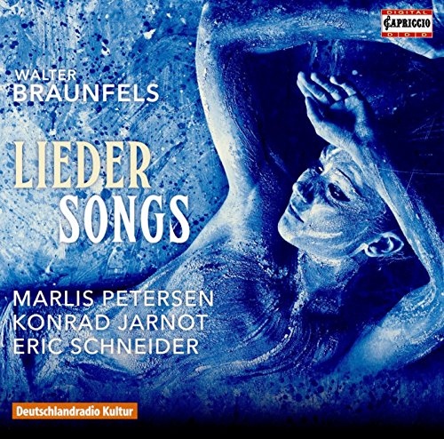 A blue-toned CD cover featuring a woman's face with her hand raised.