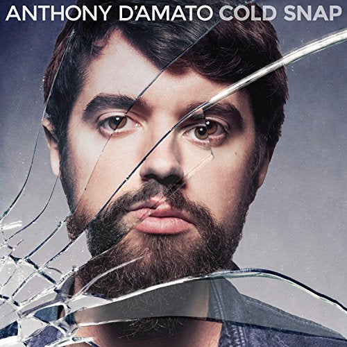 Man's face visible through cracked glass, with text "Anthony D'Amato Cold Snap" above.