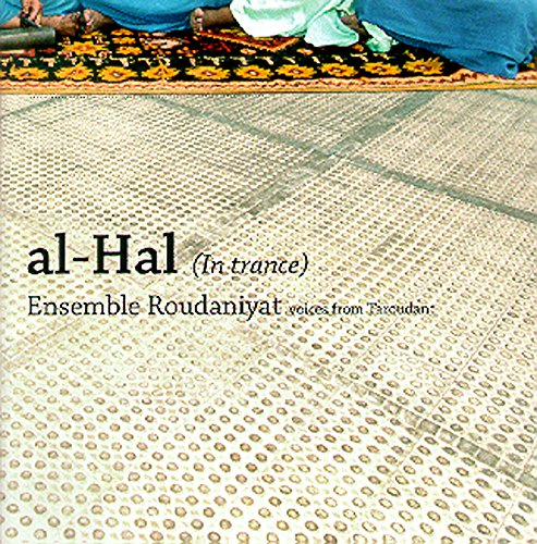 CD cover with patterned floor and people sitting on a rug.