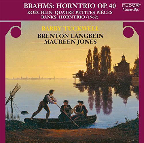 "CD cover featuring a serene lake scene with three men in a boat."
