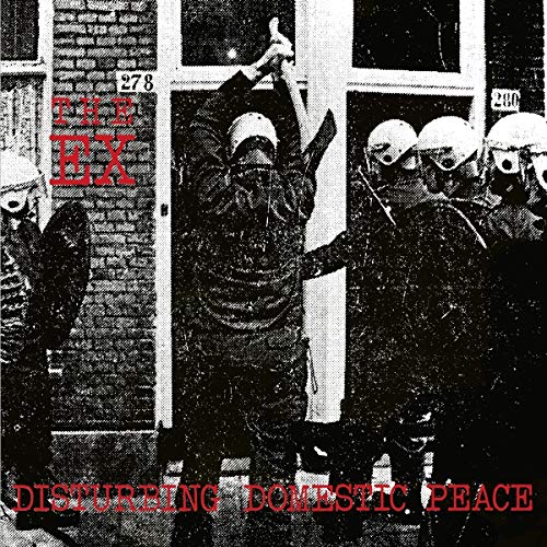 "Black and white image of police surrounding a person, with red text overlay."