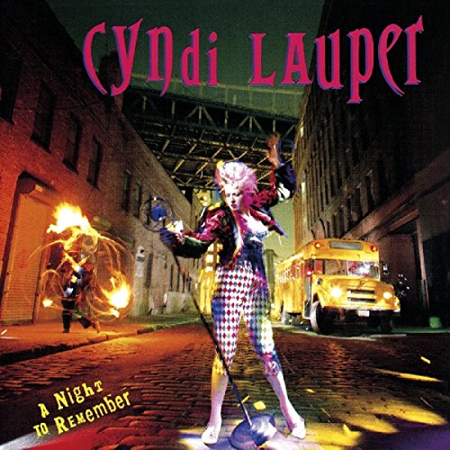 Cyndi Lauper's album cover: a woman standing on a street at night.