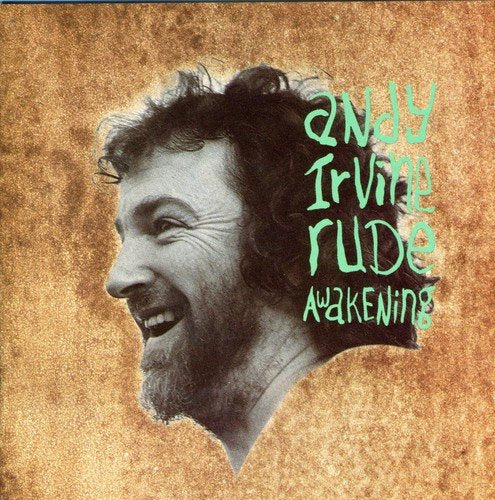 "Album cover with a black-and-white man laughing, text 'andy irvine rude awakening' on brown background."