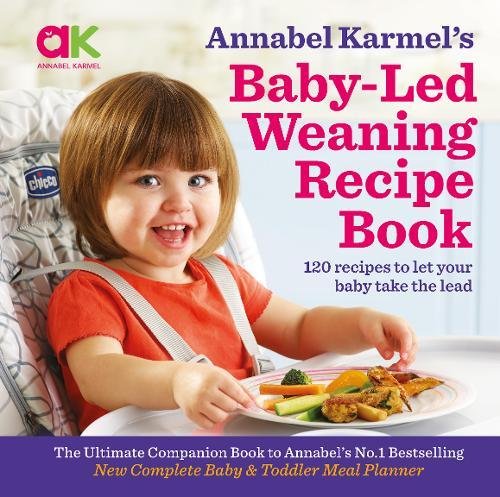 "Book cover featuring a baby eating from a plate, with title and author name."