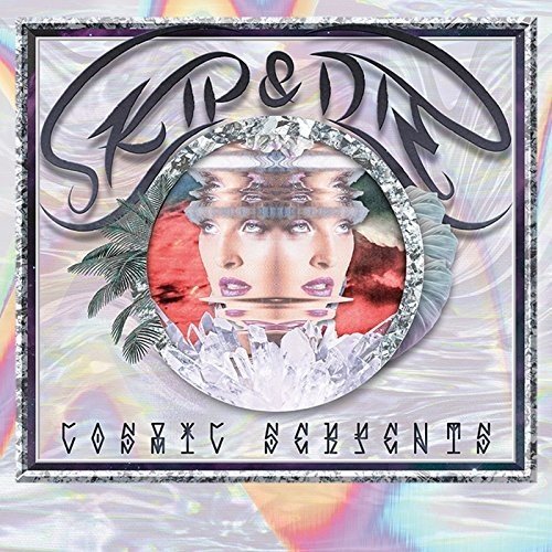 Album cover with mirrored face, crystals, and foliage on a shimmering silver background.