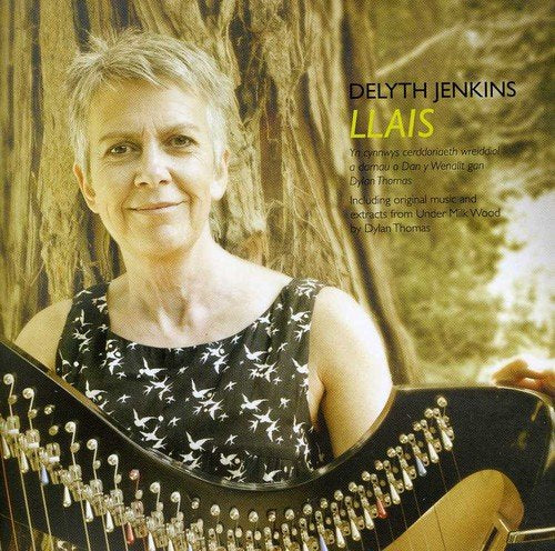 Album cover: woman holding harp, black dress with white birds, tree trunk background.