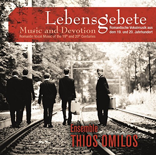 "CD cover featuring four men in suits walking on train tracks, red banner on top."