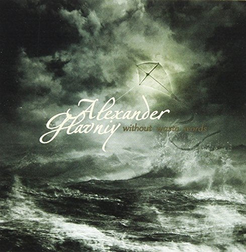 "Album cover with a kite flying over stormy sea and dark clouds."