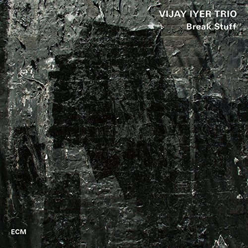"Black vinyl album cover with 'Vijay Iyer Trio - Break Stuff' in white text."