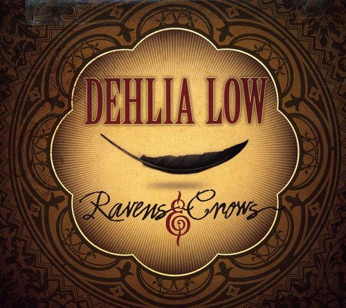 "Album cover with 'Dehlia Low' and 'Ravens & Crows' text, featuring a black feather."
