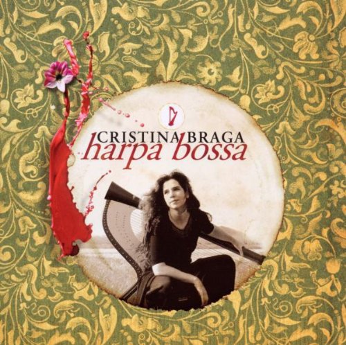 "Album cover with a woman sitting with a harp, ornate green and gold background."