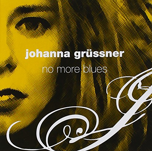 "CD album cover with a woman's face and white swirls on a yellow background."