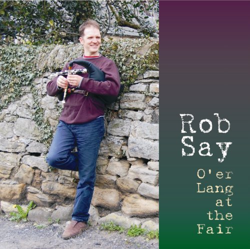 "Album cover with a man holding bagpipes against a stone wall."