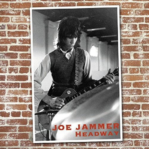 "CD cover with a black-and-white photo of a man playing an electric guitar."