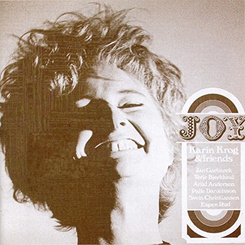 Sepia-toned album cover featuring a woman with eyes closed, hand to her face.