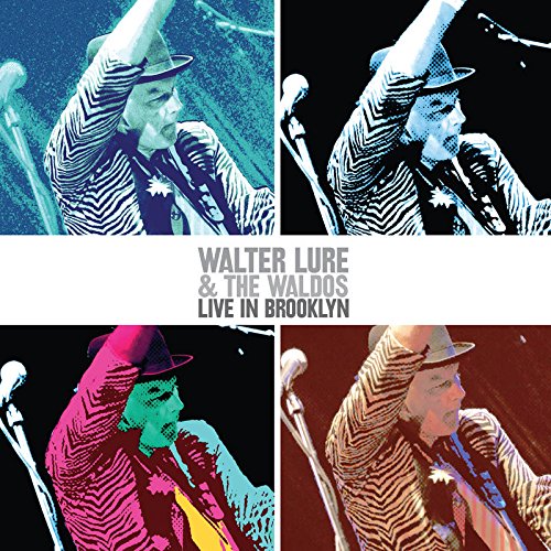 "Album cover with four images of a man singing into a microphone."
