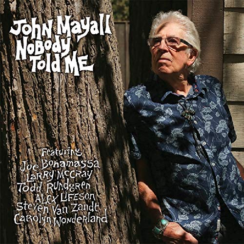 Album cover with older man leaning against a tree, wearing blue floral shirt.