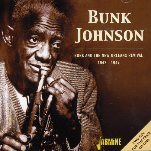 "CD cover featuring sepia-toned image of man playing trumpet, with artist's name."