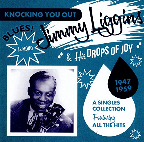 "CD cover with a man holding a guitar, blue and white design."