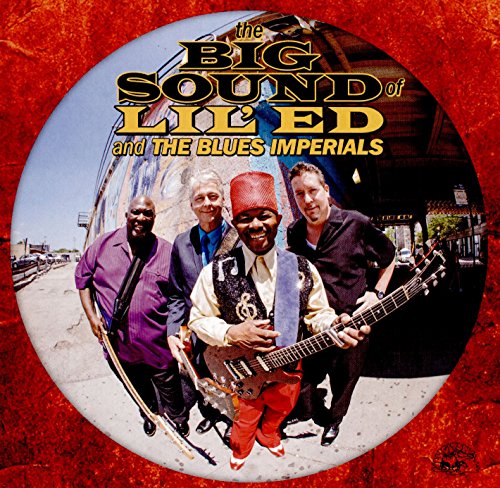 "CD cover with four men, one holding a guitar, on a red background."