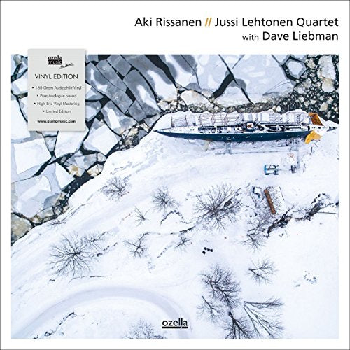 Vinyl record cover featuring a snowy landscape with bare trees and a frozen body of water.