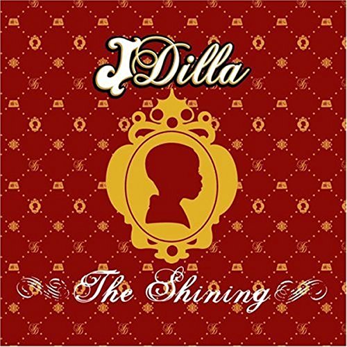 Red album cover with gold pattern, silhouette of a crowned head, and white text.