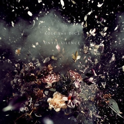 "CD cover with 'Roll The Dice - Until Silence' text, surrounded by flowers and debris."