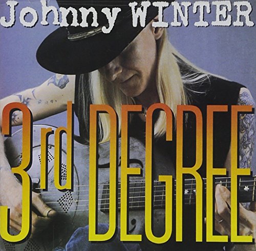 Johnny Winter album cover featuring a man with blonde hair playing an electric guitar.