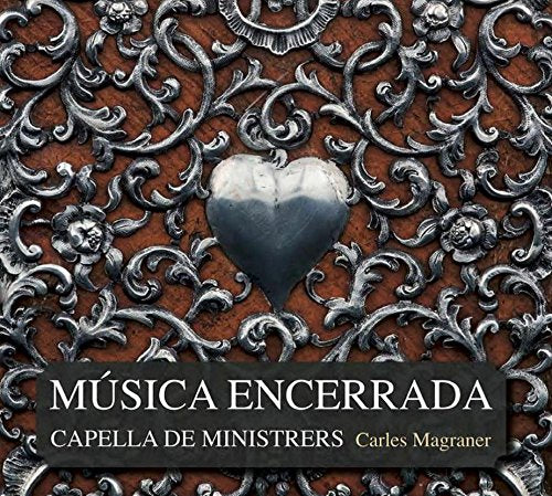 "CD cover with ornate silver design, heart, and white text on dark banner."