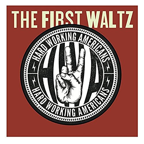 Red album cover with hand gesture and text "The First Waltz" and "Hard Working Americans".