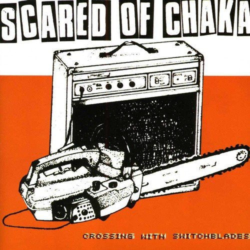Album cover with orange background, amplifier, and chainsaw illustration, titled "Scared of Chaka".