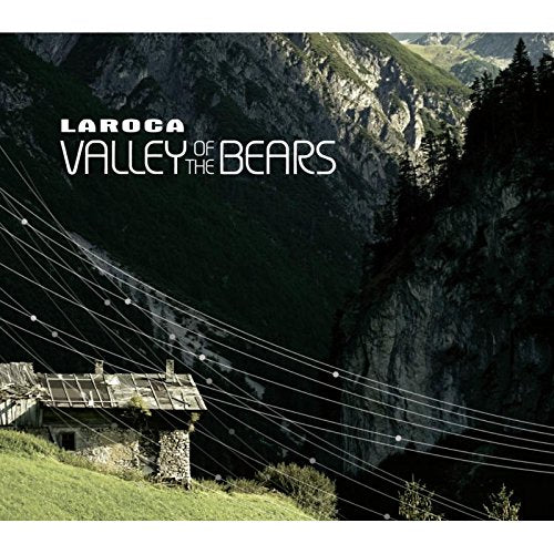 "Album cover with a stone house and mountains, titled 'Laroca - Valley of the Bears'."