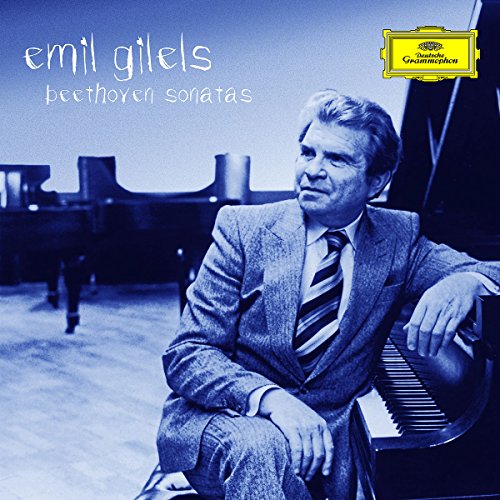 CD cover featuring a man sitting beside a grand piano, wearing a suit.