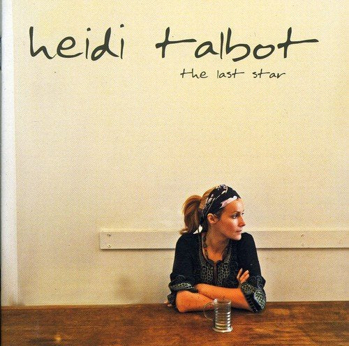 Album cover with Heidi Talbot sitting at a wooden table, looking to her right.