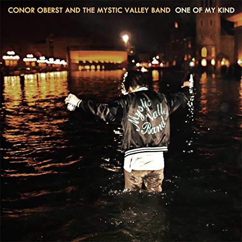 "DVD cover featuring a man standing in water, wearing a 'Mystic Valley Band' jacket."