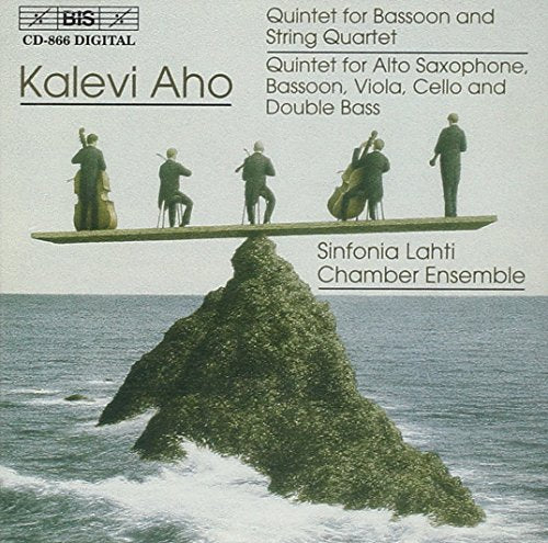 CD cover featuring musicians on a rock surrounded by water, with text and logo.
