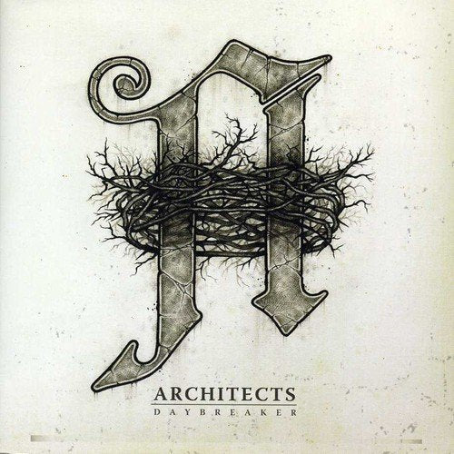 "Album cover featuring a stylized letter 'A' with twigs and branches, on a cracked surface."