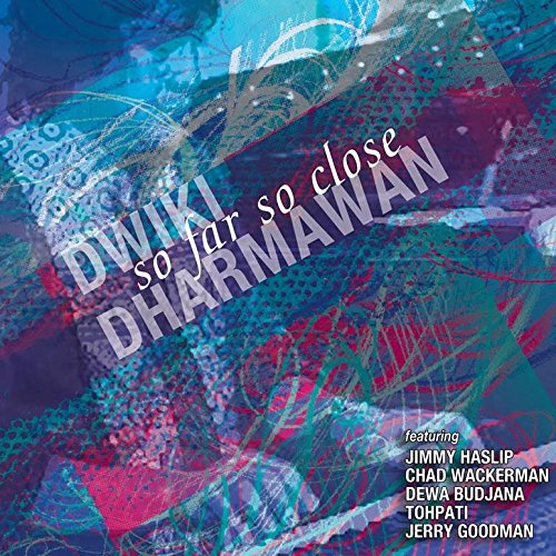 "Dwiki Dharmawan's album cover featuring abstract blue, red, and green patterns and text."