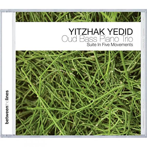 CD case cover with grass texture and white label, displaying artist and album information.