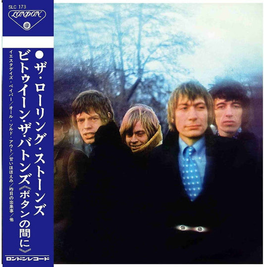 The Rolling Stones album cover featuring five band members standing together outdoors.